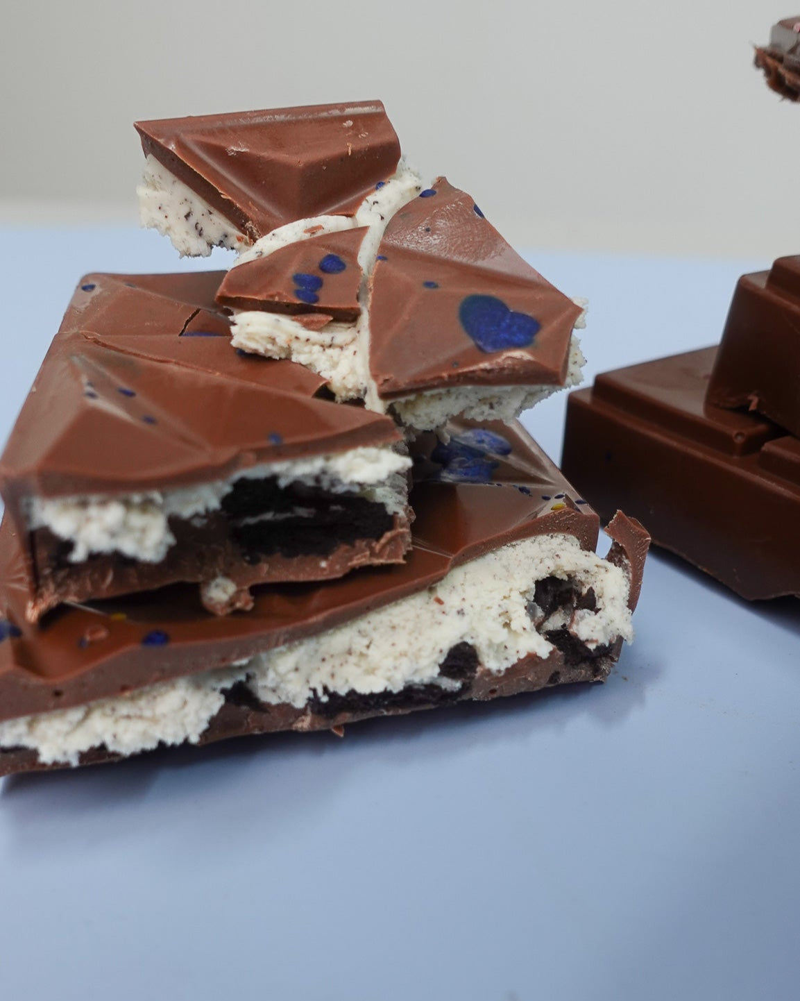 Cookies & Cream Ganache and Oreo Pieces Milk Choc 250g